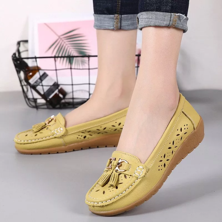 Comfortable women's moccasin sandals with arch support, soft, breathable for all-day wear.