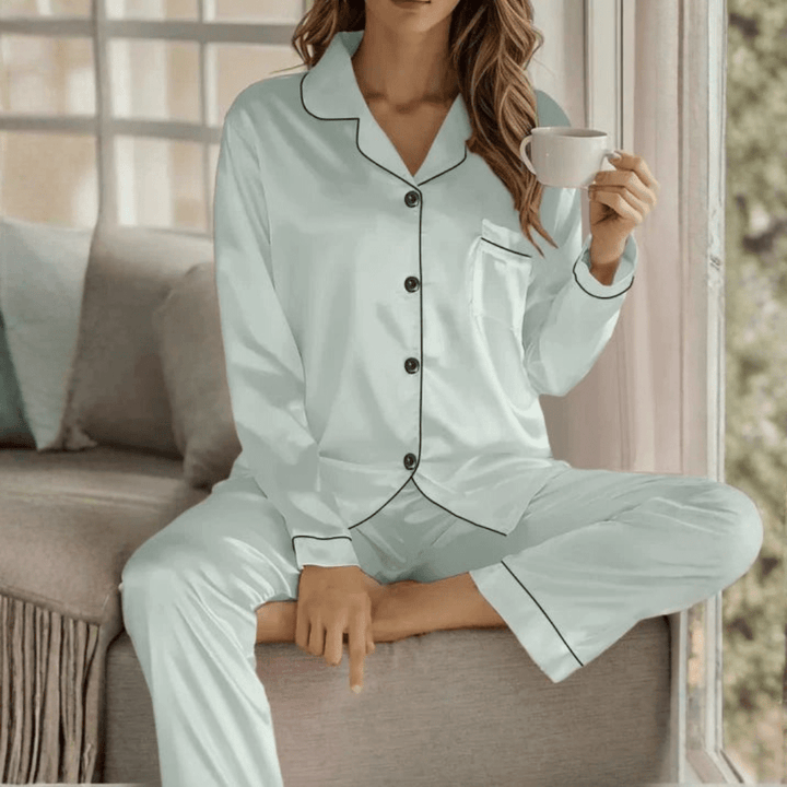 Premium women's soft & breathable button-front pajama set, elegant for sleep and comfortable for lounge.