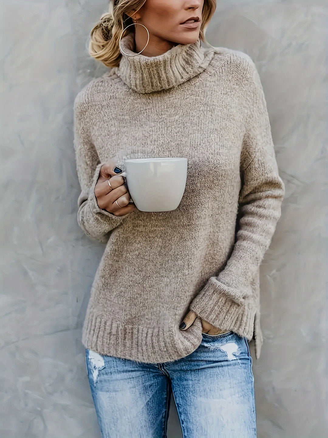 Women's soft knit turtleneck sweater with stylish split hem. Perfect for fall casual wear.