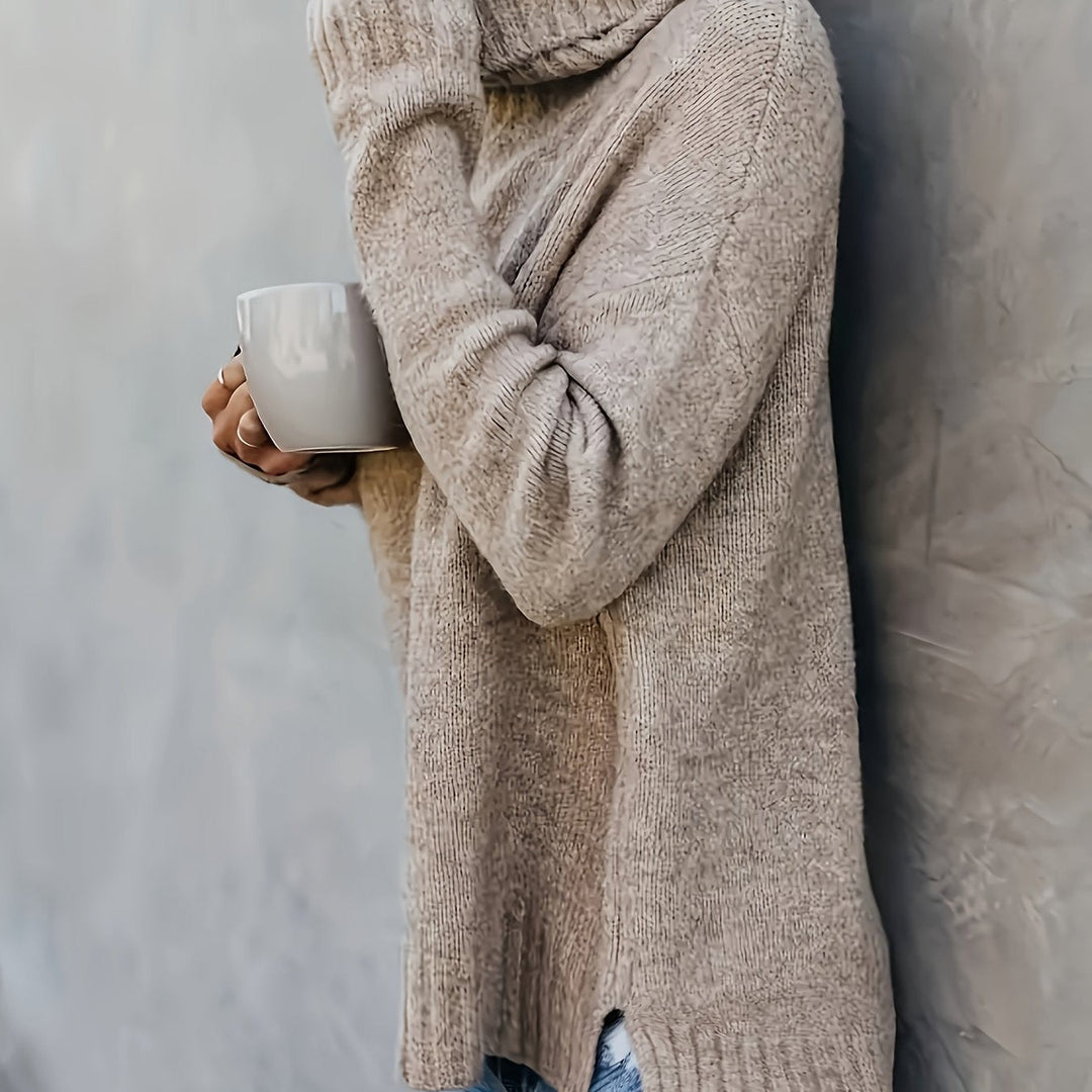 Versatile women's long sleeve turtleneck sweater. Split hem detail enhances any fall outfit.