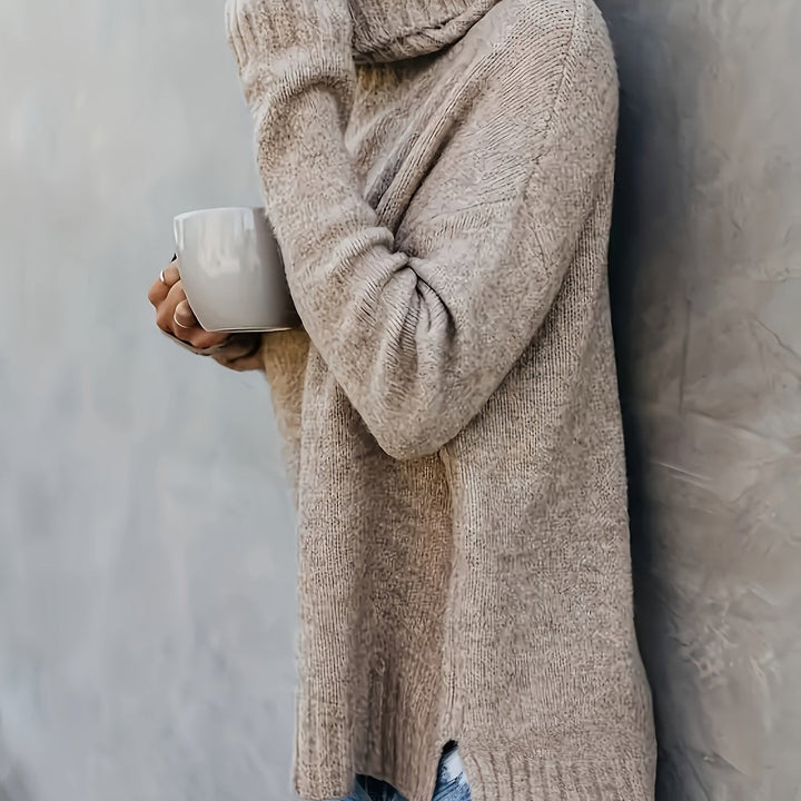 Versatile women's long sleeve turtleneck sweater. Split hem detail enhances any fall outfit.
