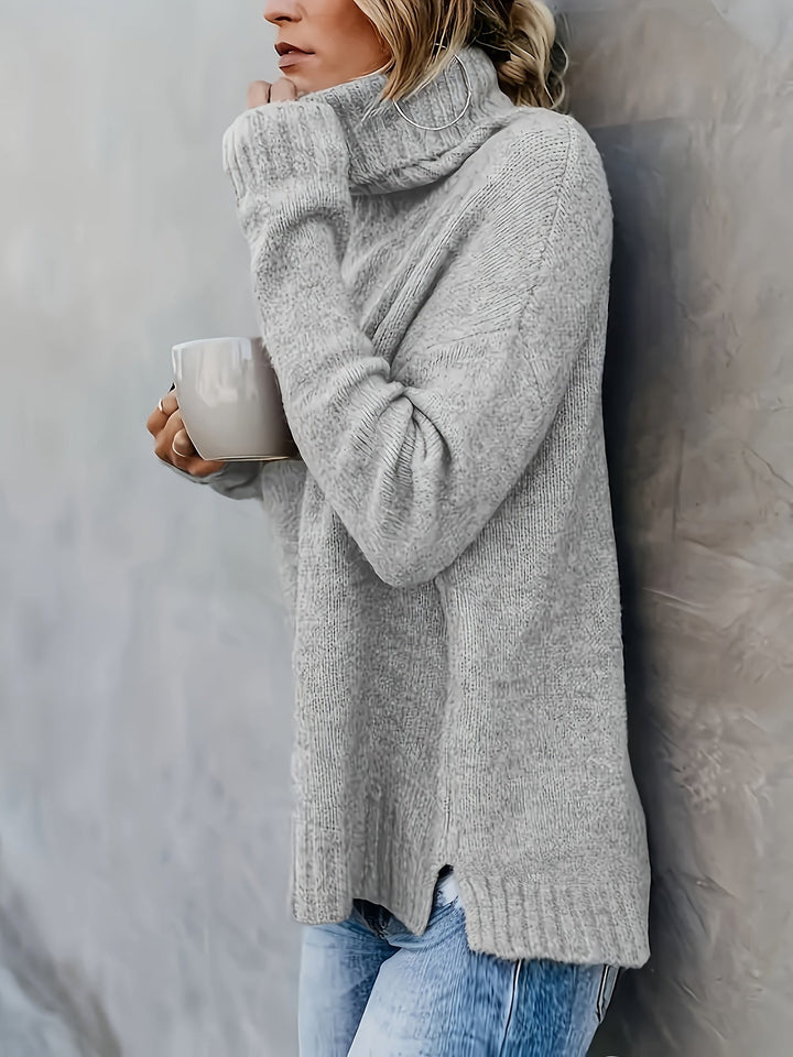 Casual fall fashion: Women's cozy turtleneck sweater featuring a chic split hem design.