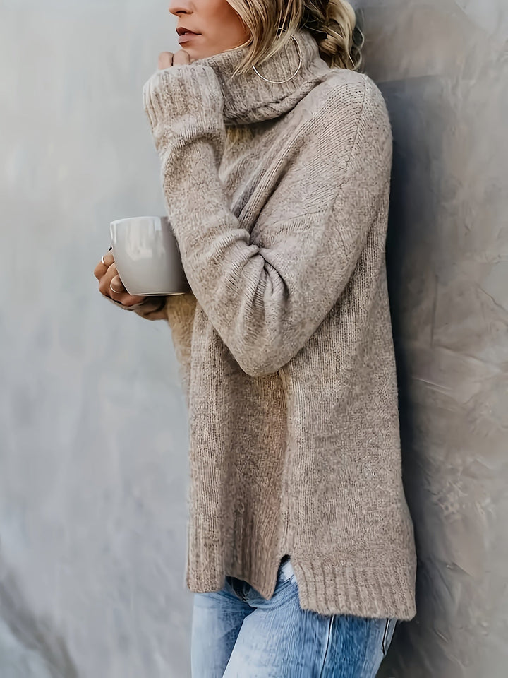 Effortless fall style: Women's comfortable turtleneck sweater with a modern split hem detail.