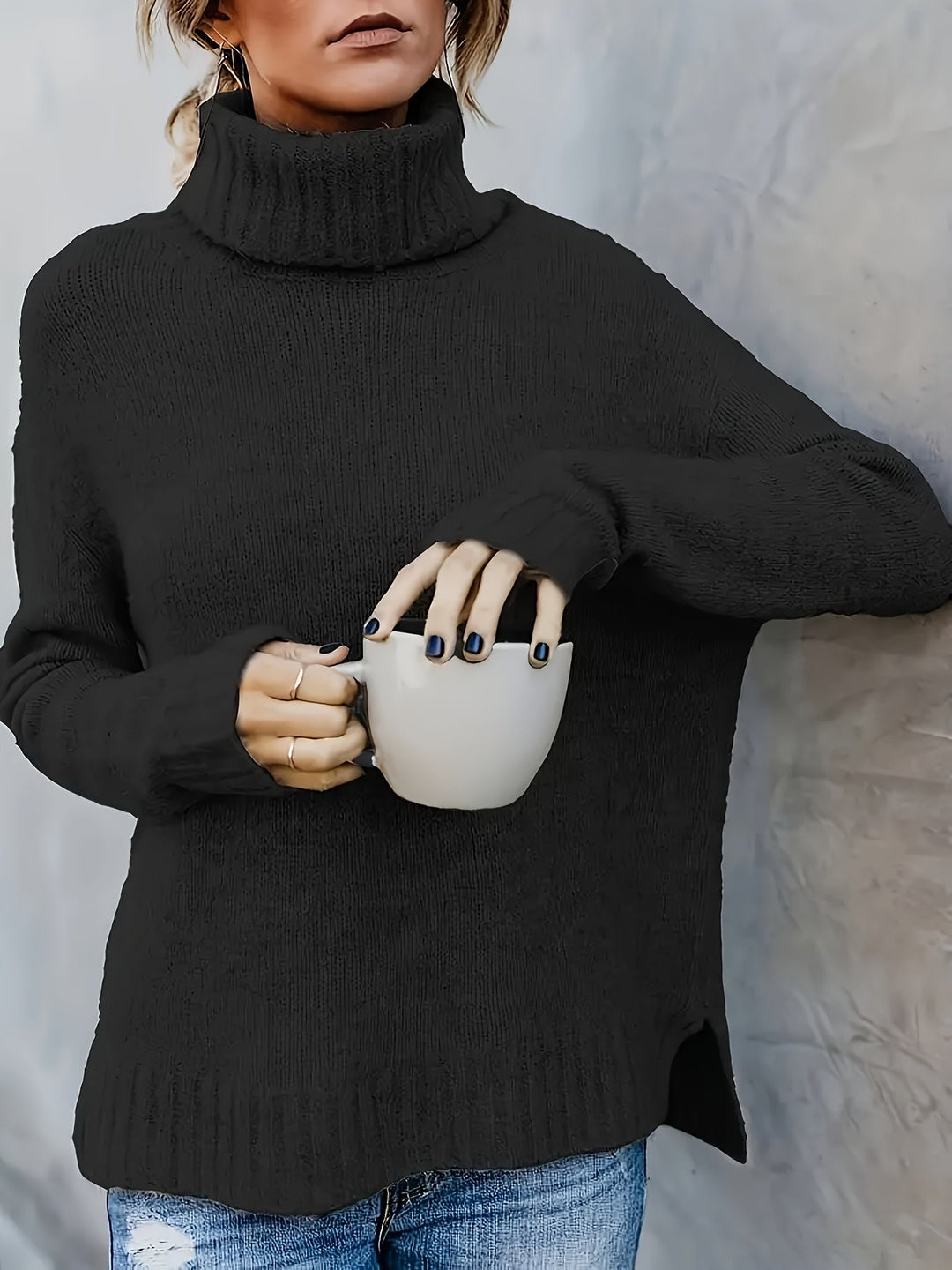 Women's long sleeve turtleneck with elegant split hem. Essential for versatile fall/winter style.