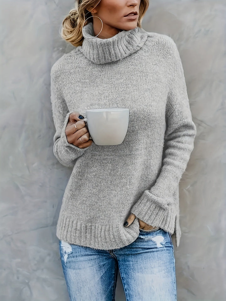 Cozy women's pullover turtleneck sweater. Effortless split hem design for autumn fashion.