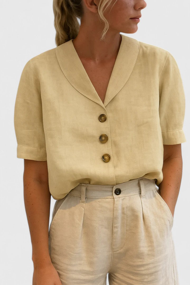 Women's sophisticated button-up blouse, long sleeve, collared. Elegant & versatile for office or casual wear.