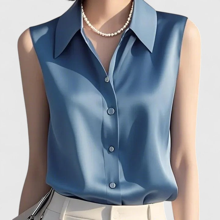 Chic women's sleeveless button-up blouse, sophisticated and lightweight for professional office fashion. Elegant ladies shirt.