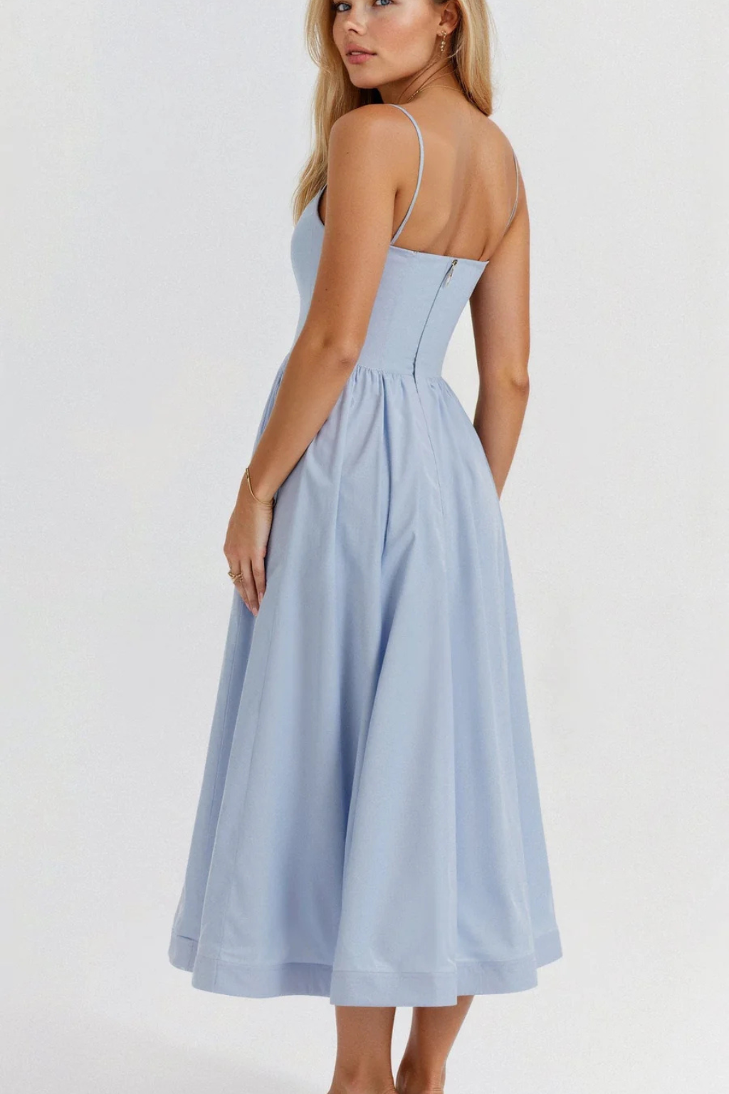 Modern women's spaghetti strap midi dress, a comfortable and chic summer fashion essential.