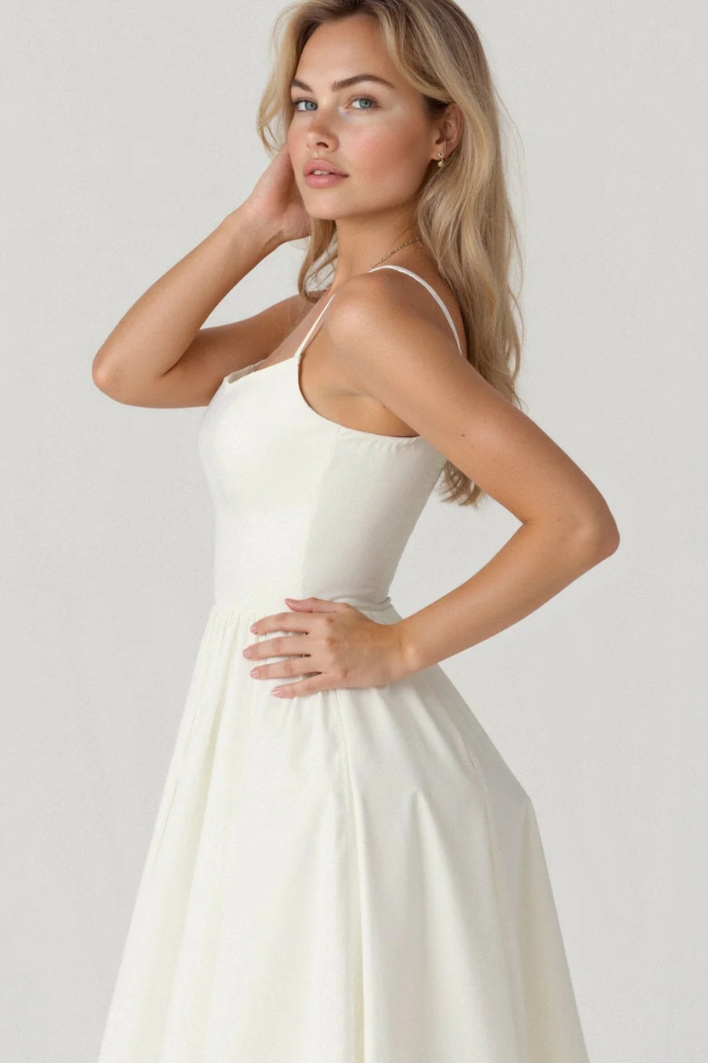 Lightweight spaghetti strap midi sundress for women, a breezy option for spring and summer.