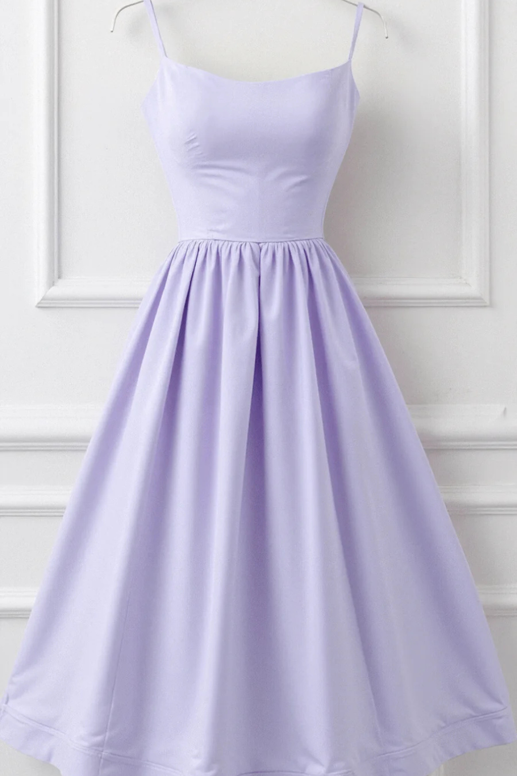 Elegant spaghetti strap midi sundress for women, offering a chic look for vacation or day.
