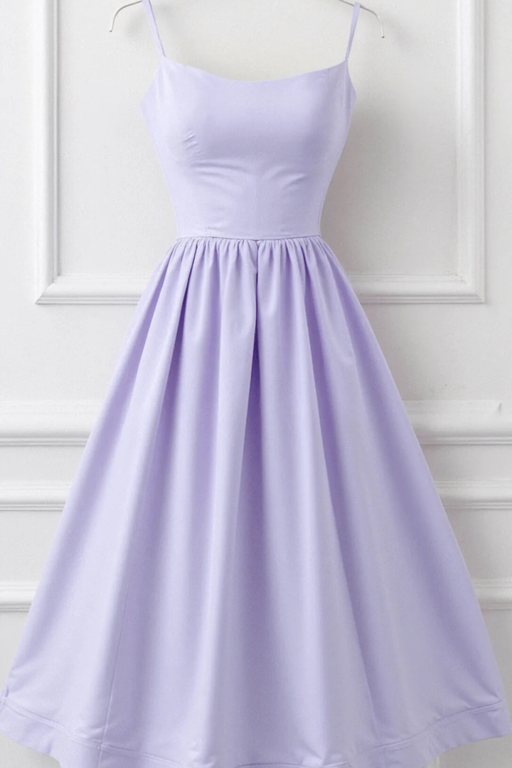 Elegant spaghetti strap midi sundress for women, offering a chic look for vacation or day.