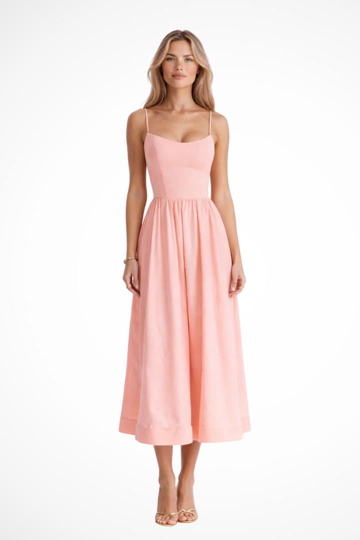 Comfortable women's summer midi dress featuring thin spaghetti straps and a relaxed fit.