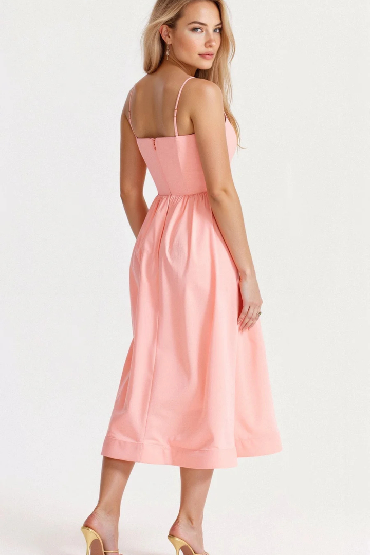 Chic spaghetti strap midi sundress, a versatile women's dress for casual or spring outings.