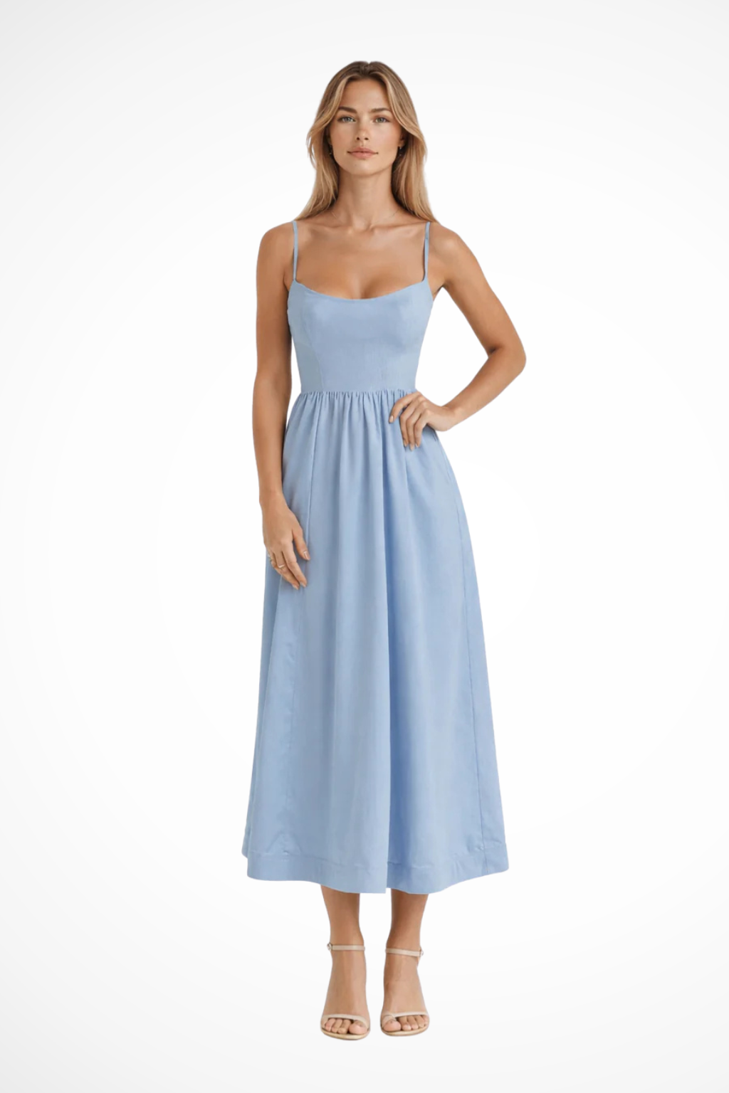 Women's elegant flowy midi dress with spaghetti straps, perfect for spring fashion.