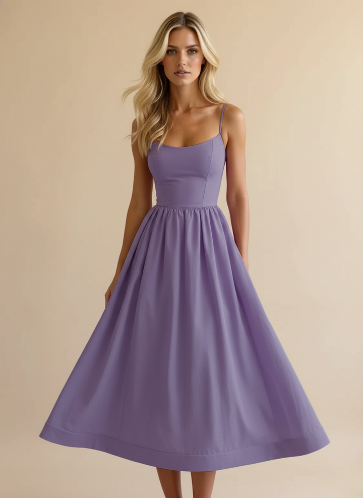 Summer fashion women's spaghetti strap A-line midi dress. A versatile scoop neck vacation outfit.