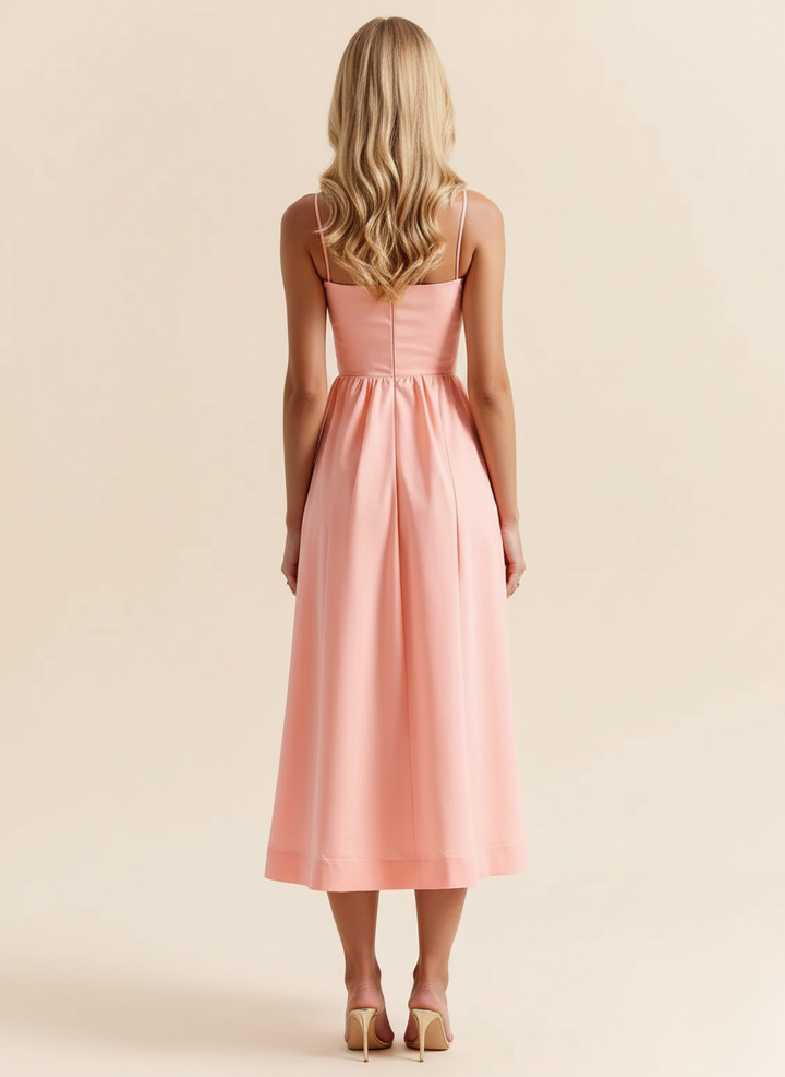 Chic women's party dress: spaghetti strap, scoop neck, A-line midi. Elegant choice for special summer events.