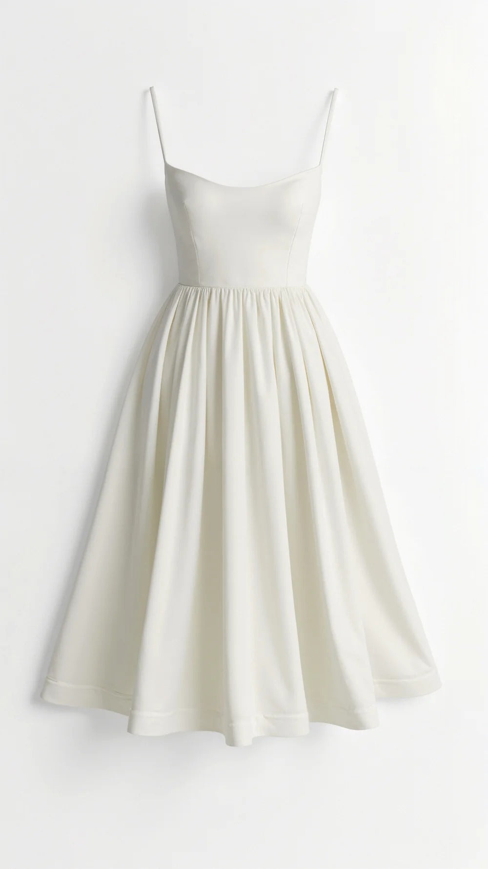 Comfortable women's A-line midi dress with spaghetti straps & scoop neck. Perfect for elegant summer fashion.