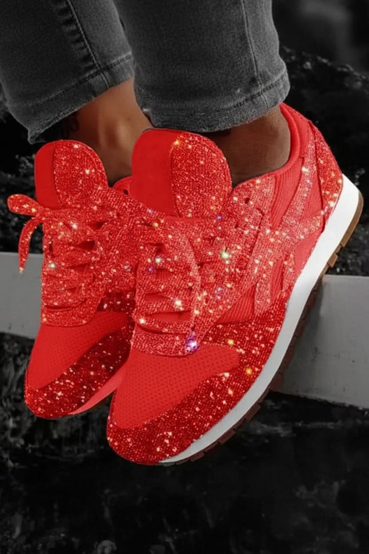 Detail of women's trendy glitter sneakers, showcasing the shimmering material and quality construction.