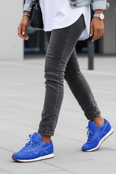 Trendy women's sparkle sneakers, featuring vibrant glitter and secure lace-up design. Casual chic footwear.