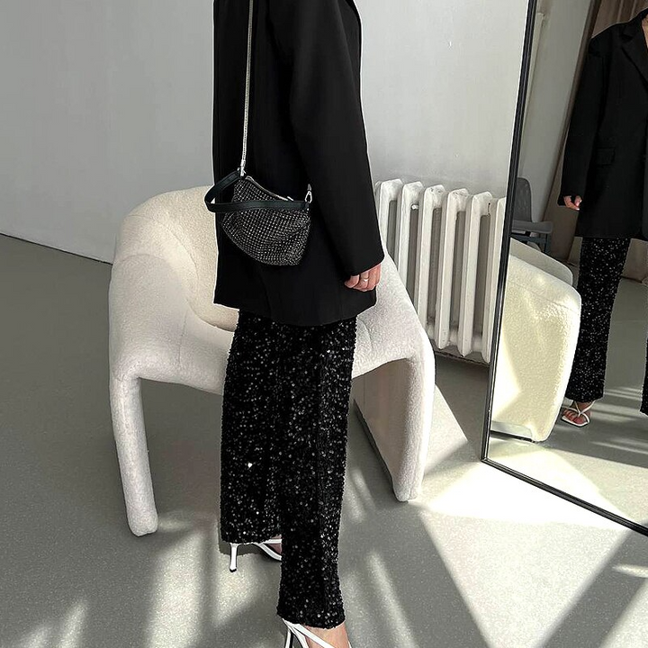 Shiny women's high-waist party pants, a fashion statement piece for festive occasions & club nights.