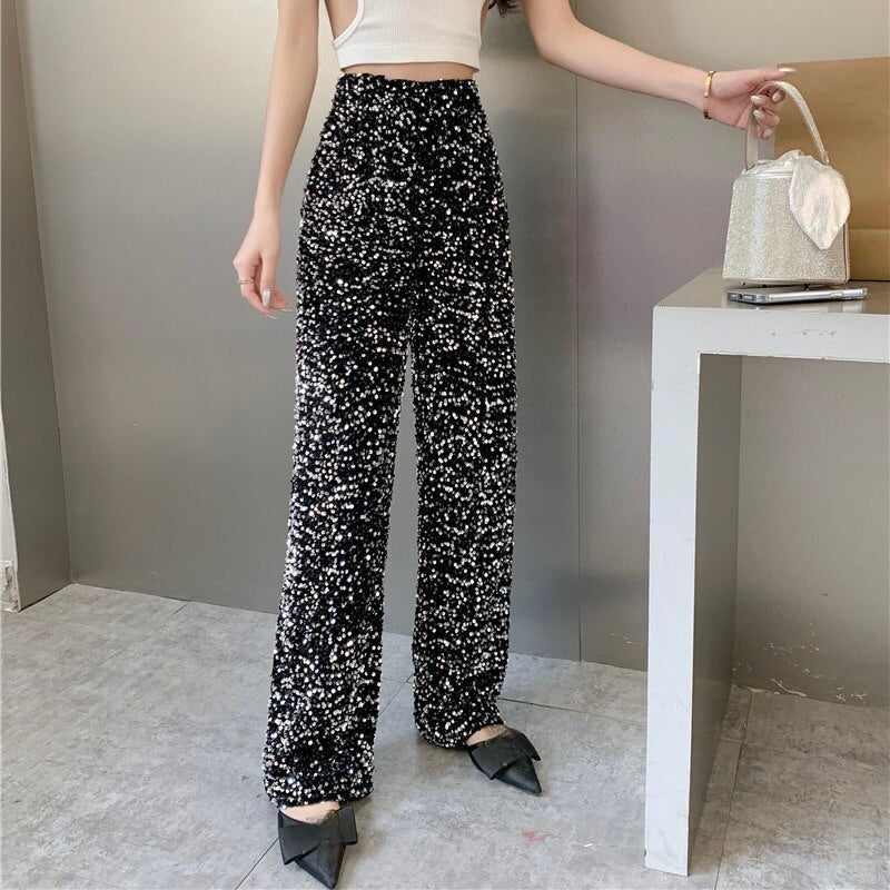 Women's high-waist sparkling pants with a dazzling finish, perfect for festive parties & chic evening events.