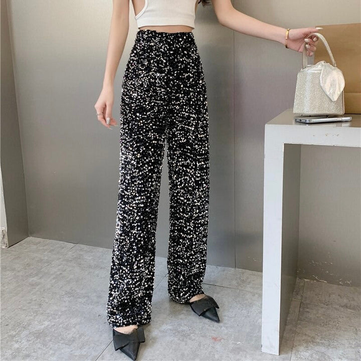 Women's high-waist sparkling pants with a dazzling finish, perfect for festive parties & chic evening events.