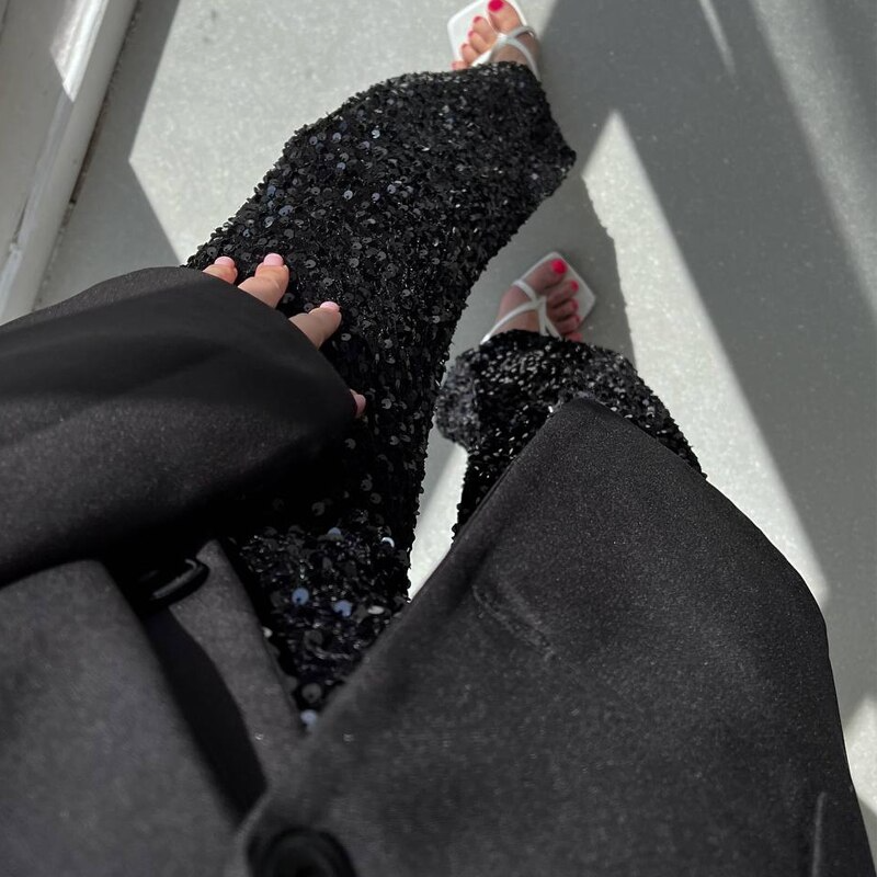 Make a statement with these women's sparkling high-waist party pants, perfect for clubwear and dazzling night outs.