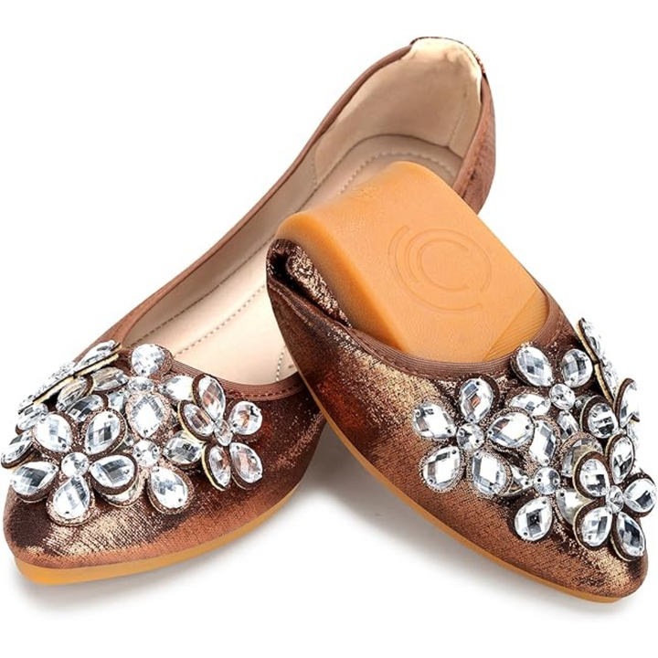 Comfortable women's ballet flats with a cushioned sole and sparkling rhinestone upper, perfect for all-day wear.