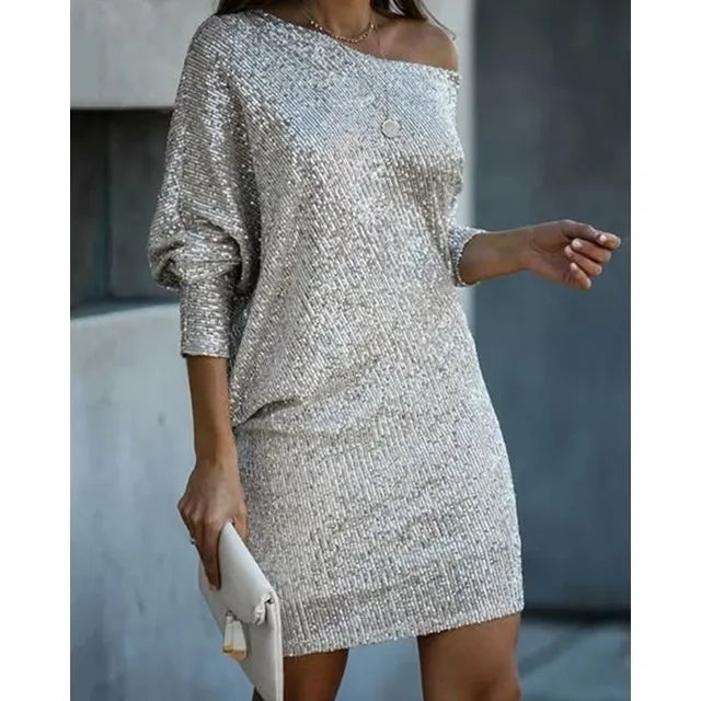Shimmering women's mini sequin dress, perfect for a glamorous party or special occasion.