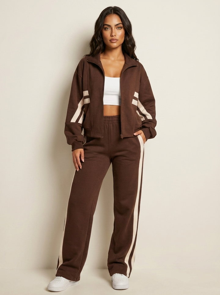Women's sporty tracksuit set with contrast stripe zip-up jacket & wide leg pants, perfect for casual wear.