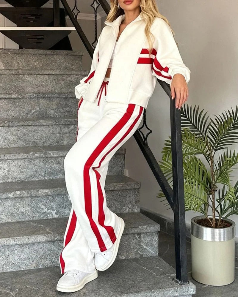 Stylish womens contrast stripe tracksuit set, a comfortable two-piece with a zip jacket & wide leg bottoms.