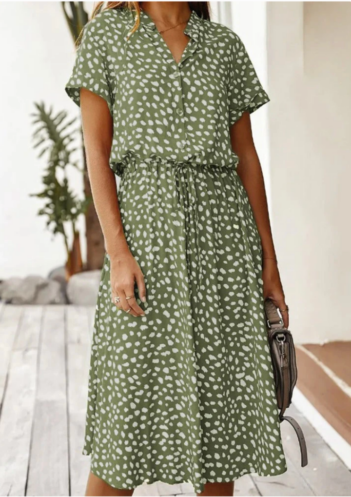 Lightweight women's spotted midi dress, V-neck, full button-down front, and breezy flutter sleeves. Summer essential.