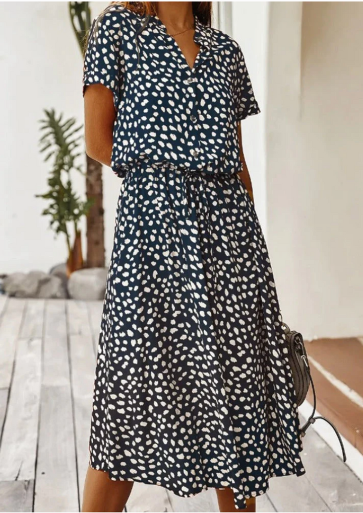 Spring fashion women's midi dress, spotted, V-neck, button-down, and comfortable for everyday wear.