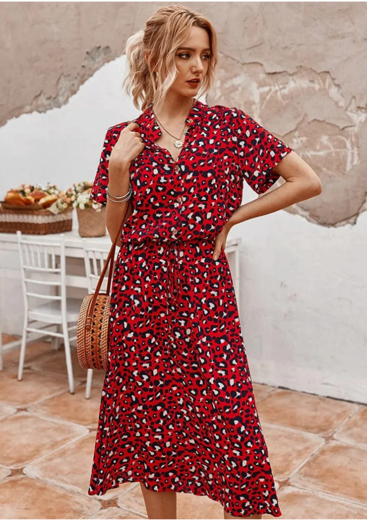 Women's flutter sleeve spotted midi dress, V-neck, button-down front. Comfortable & elegant spring/summer wear.