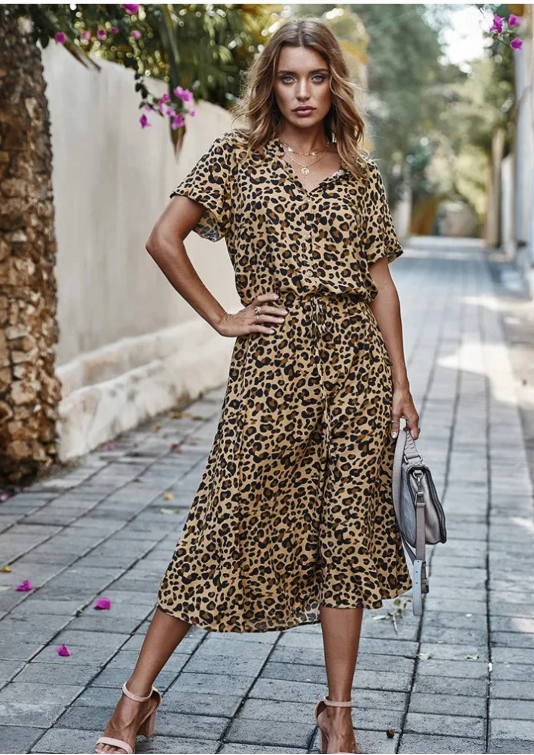 Spotted midi dress with a flattering drawstring waist, V-neck, and button-down front for women.