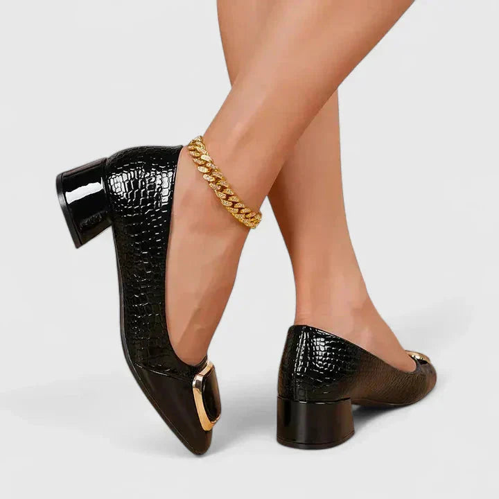 Versatile women's block heel loafers with a modern square toe, perfect for business or smart casual looks.
