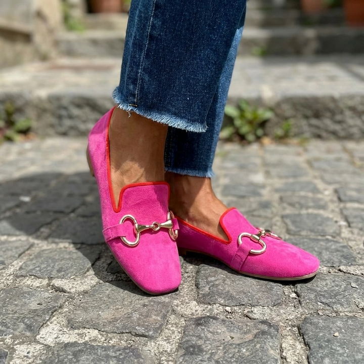 Deep pink women's flat loafers featuring a sophisticated horsebit buckle & square toe, perfect for casual chic.