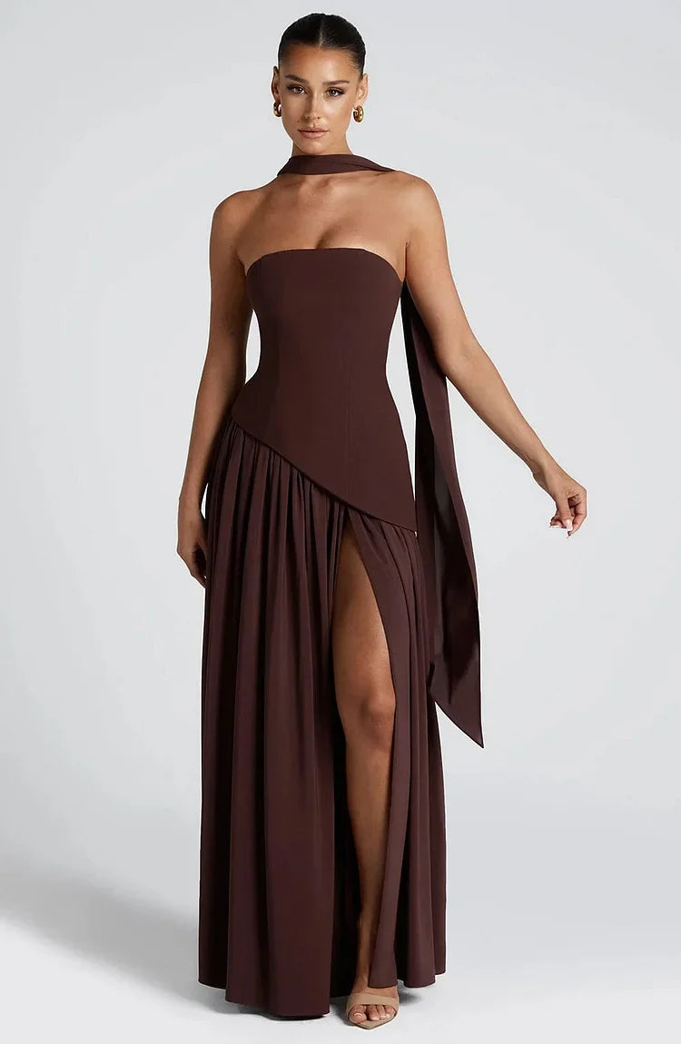 Elegant strapless party maxi dress for women, with a dramatic asymmetric flow.