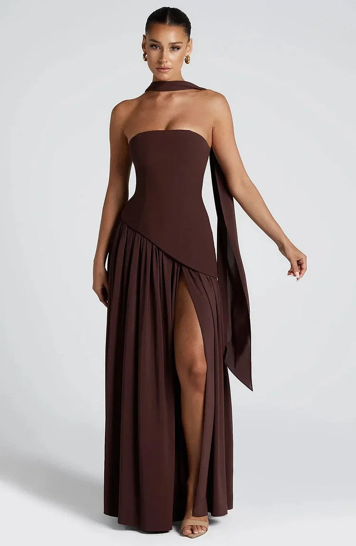 Elegant strapless party maxi dress for women, with a dramatic asymmetric flow.