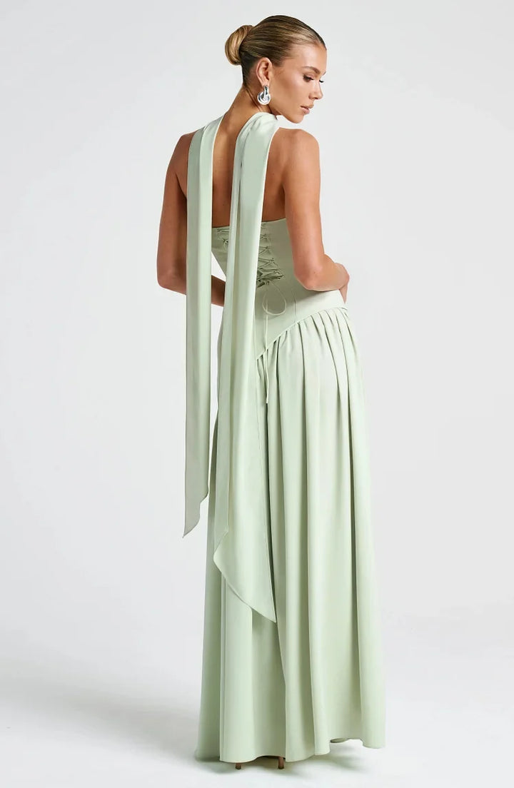 Stylish strapless summer dress, a flowing maxi with a unique asymmetric hem.