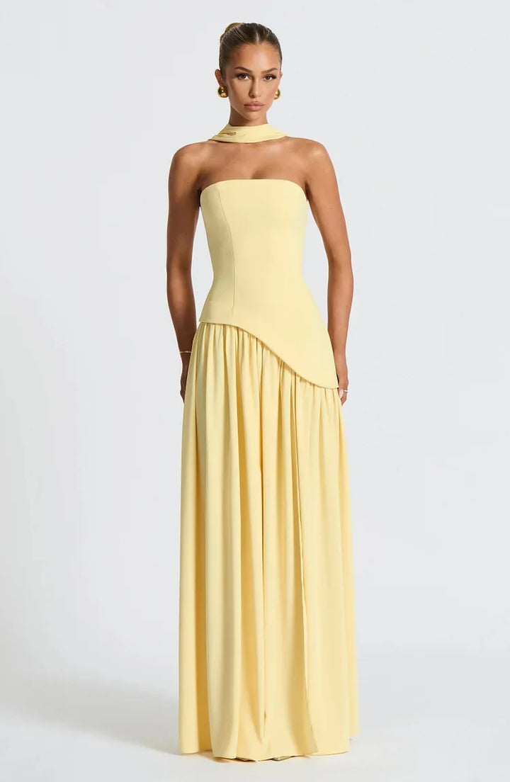Flowing asymmetric strapless maxi dress, a chic women's fashion statement for evenings.