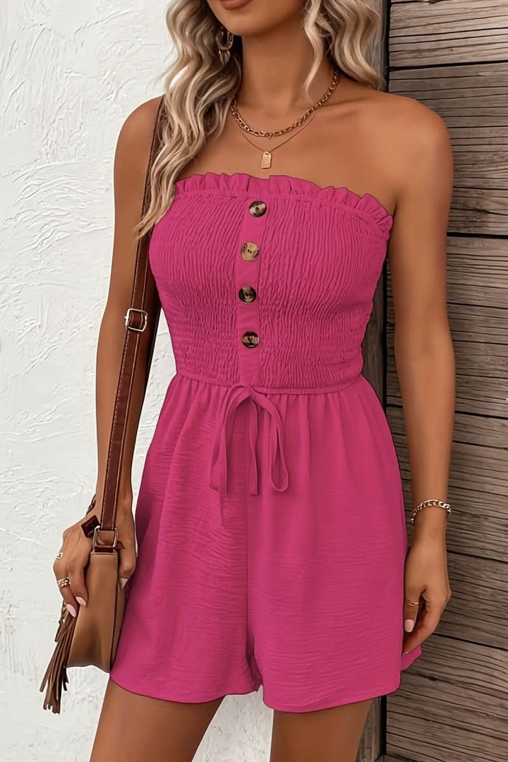 Full-length view of a women's strapless casual romper with button front details, perfect for warm weather.