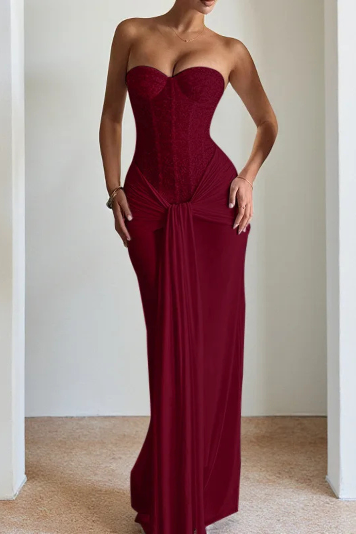 Modern women's strapless mermaid maxi dress with a sophisticated corset top, ideal for evening wear.
