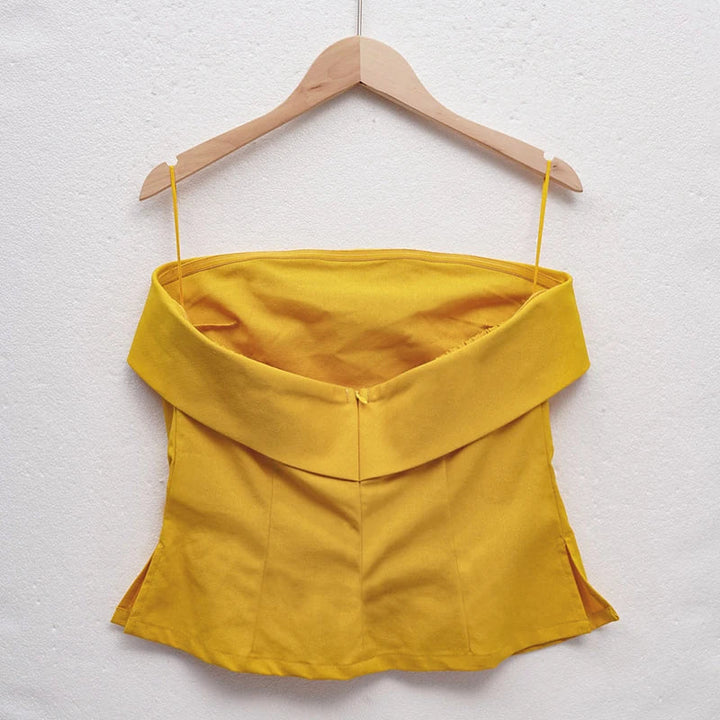 Comfortable women's sleeveless crop top, essential for versatile summer fashion, travel & beach style.