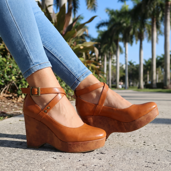 Essential women's summer wedge sandals: strappy cross-front, comfortable platform, & chic ankle strap.