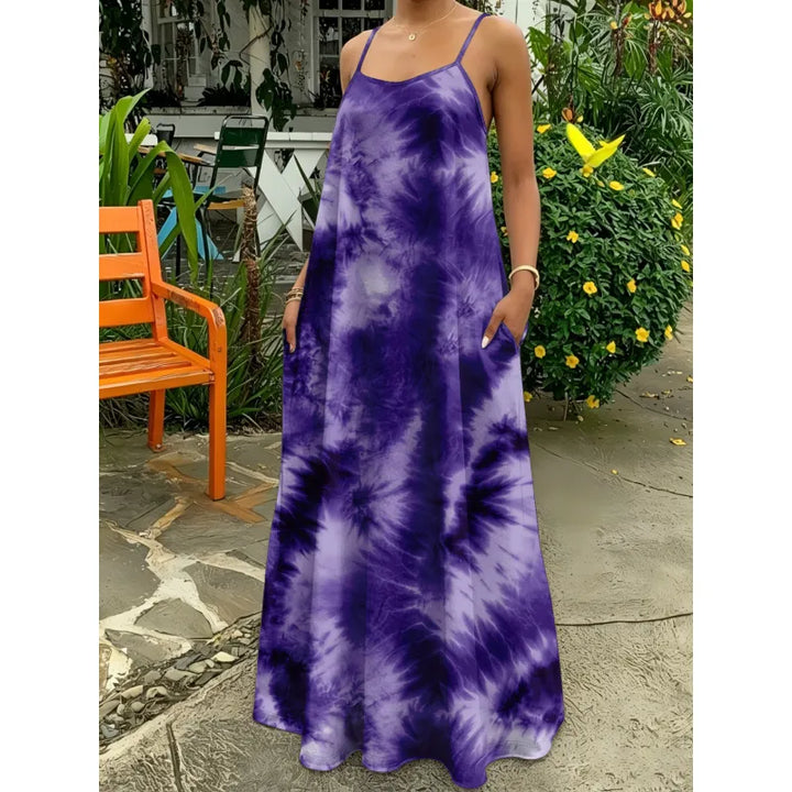 Effortless women's tie-dye maxi dress. Strappy, flowy, and comfortable for summer & vacation.