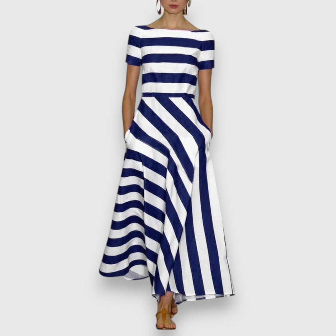 Women's striped A-line maxi dress with bateau neck, short sleeves & pockets. Perfect elegant casual summer fashion.