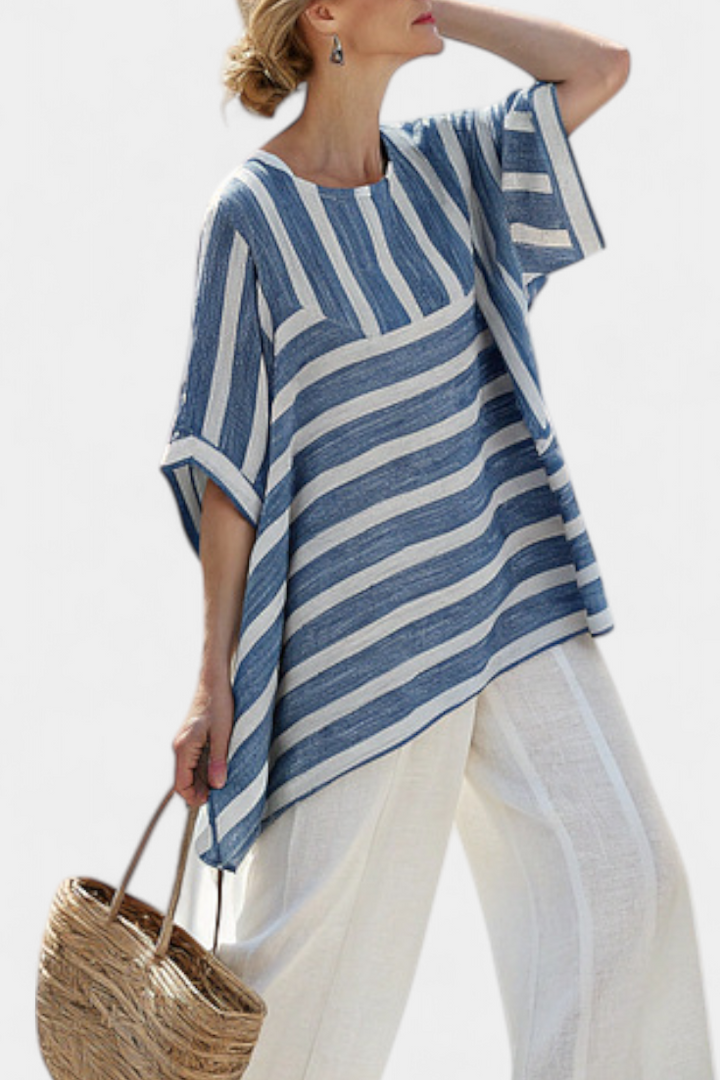 Stylish women's striped batwing top with asymmetric hem paired with comfortable wide leg pants. Summer set.