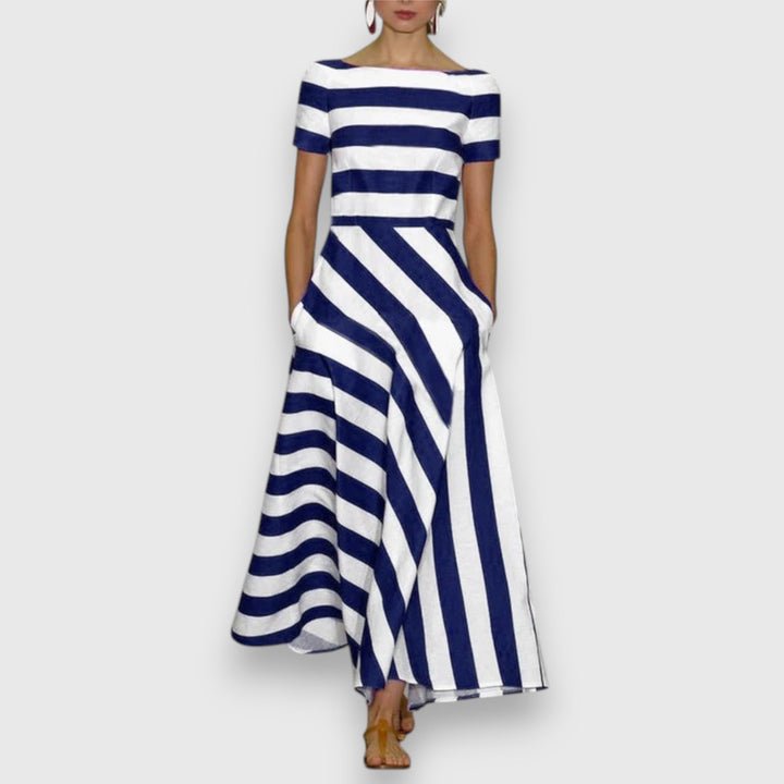 Women's striped boat neck A-line midi dress with pockets, perfect for casual spring or summer elegance.