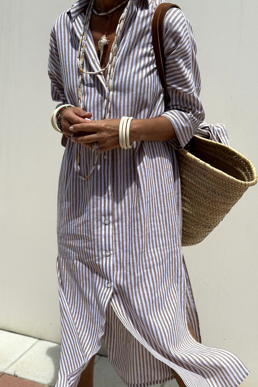 Comfortable oversized striped midi dress, button-down with a collar, great for relaxed spring and summer outfits.
